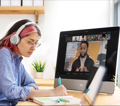 IT professional reviewing network security data during an on-demand Cisco webinar